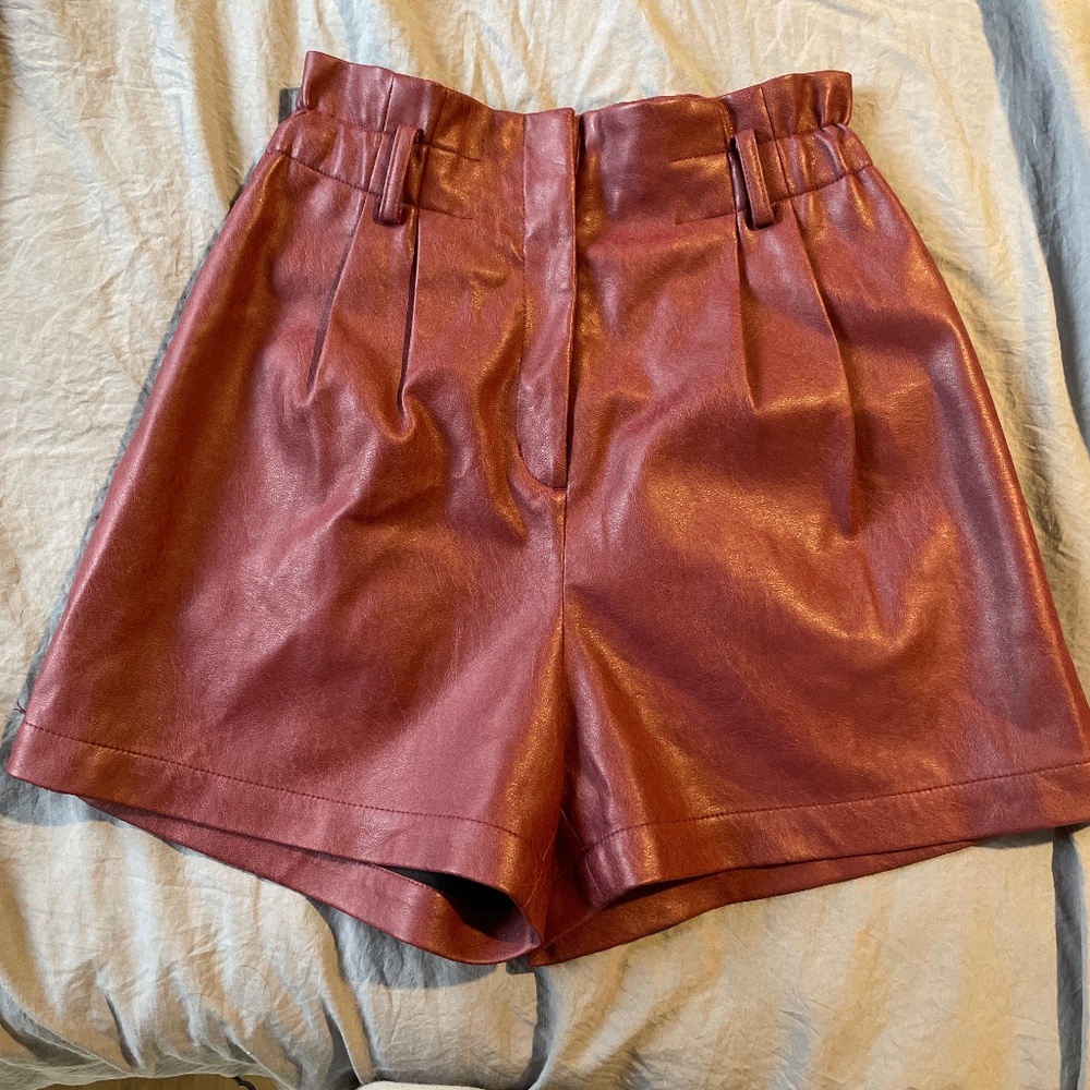 Burgundy faux leather shorts
